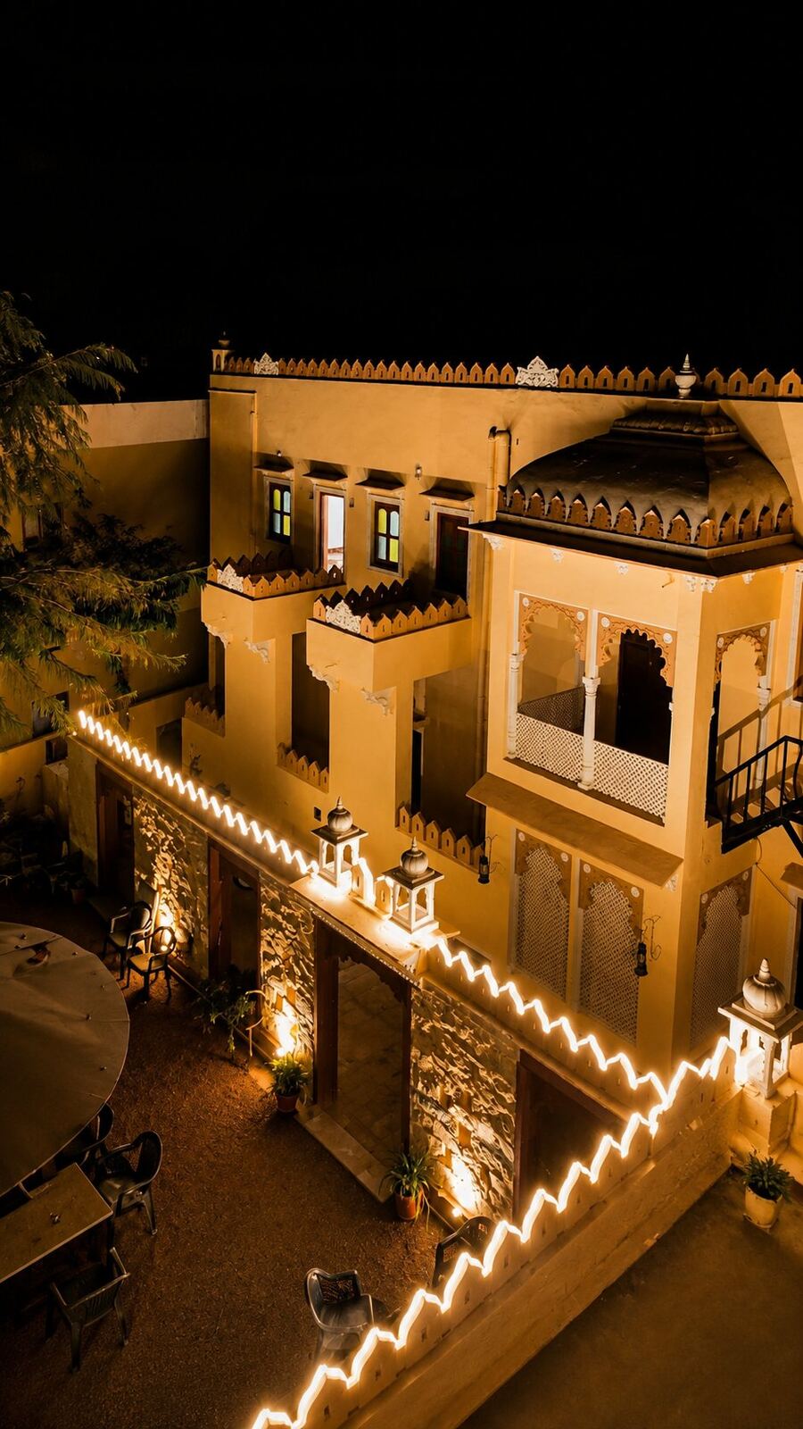 Haveli facade glowing at night